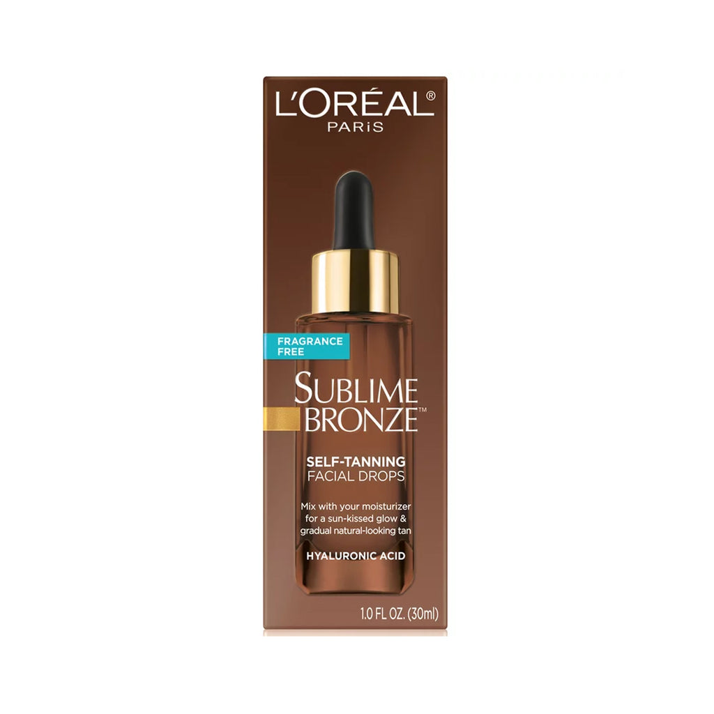 Bottle of L'Oreal Paris Sublime Bronze Self-Tanning Facial Drops, surrounded by hydrating ingredients.
