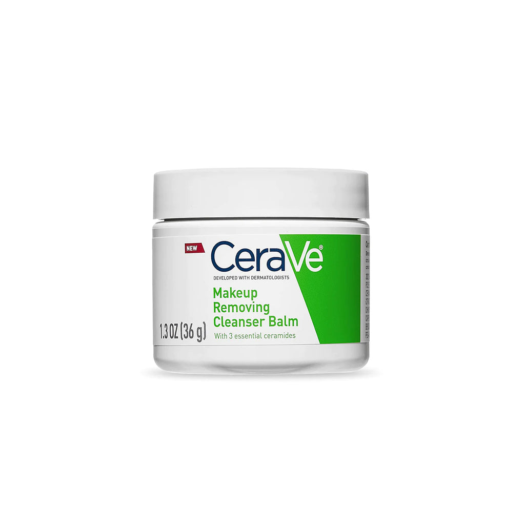 Image of CeraVe Makeup Removing Cleansing Balm jar surrounded by fresh green leaves, suitable for sensitive skin.