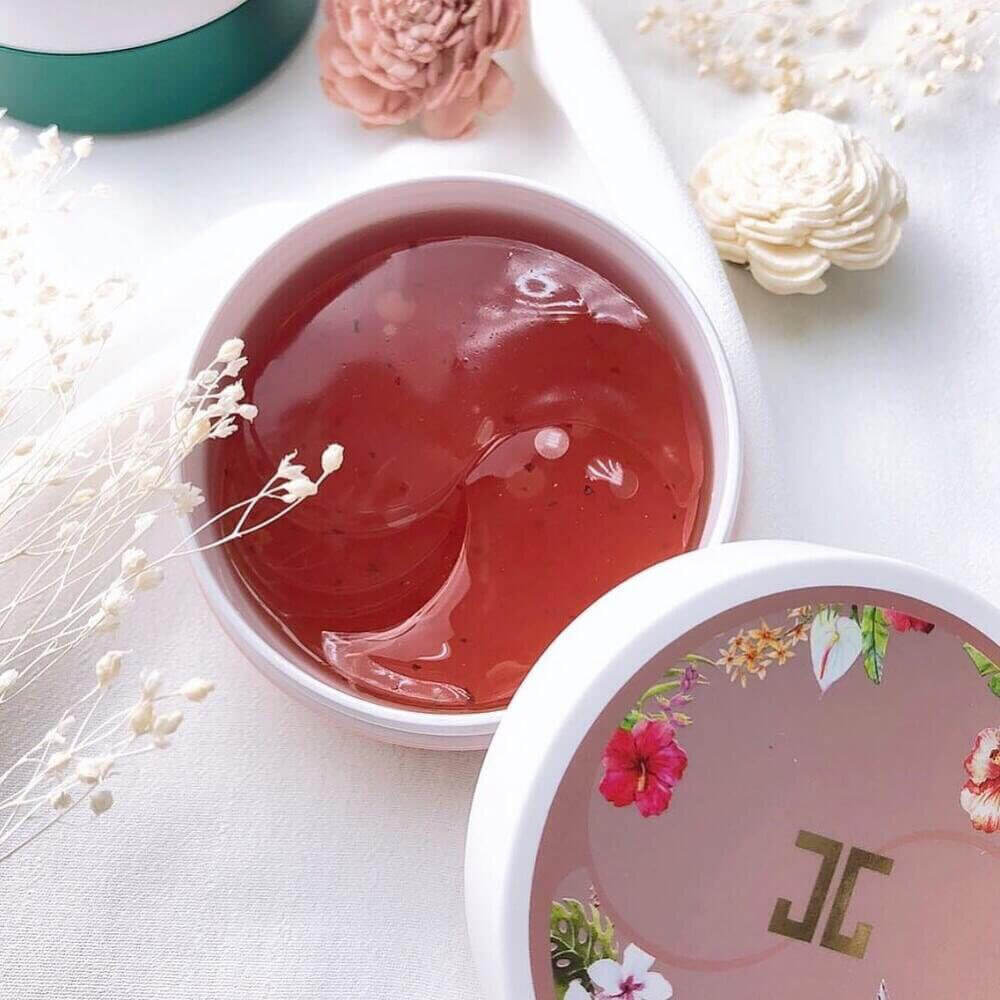 Jayjun Roselle Tea Gel Eye patches displayed in a container.